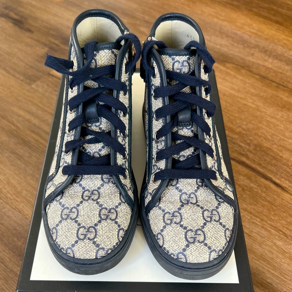 Boys Gucci High tops.